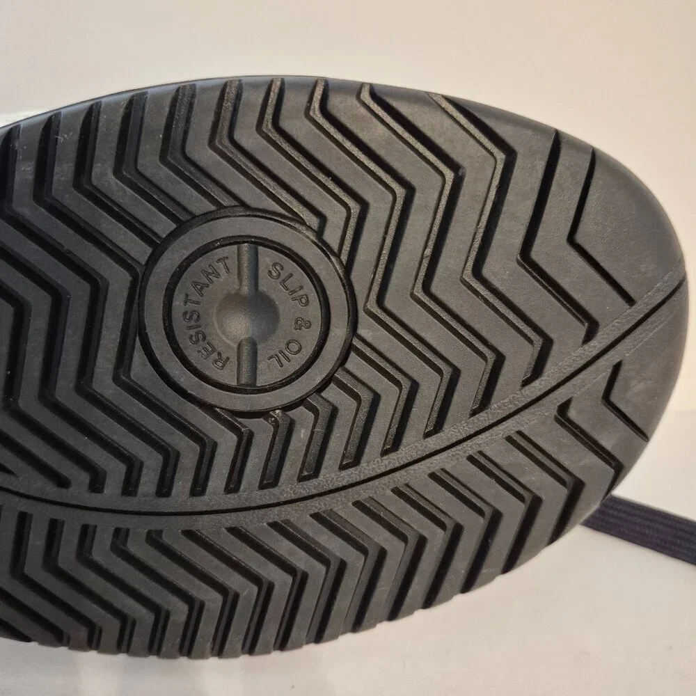 Puma men's hard toe safety shoes, size 10.
